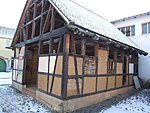 Half-timbered wokshop house