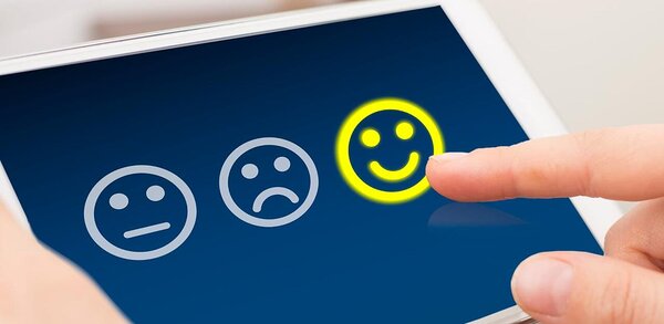Customer satisfaction concept with smiley face rating