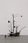 A SMALL FOREST TABLEAU plant parts, paper, modeling clay, yarn, parts of furniture etc.