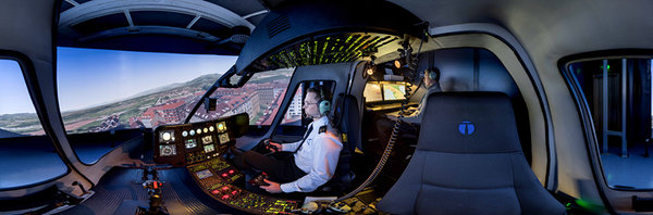 Click on the picture to look around in the airplane simulator.