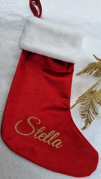 Sametist jõulusokk sädeleva kuldse nimega
