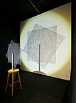 &quot;Loomine&quot;, installatsioon: digitrükk pleksiklaasil, valgusti, vari seinal, Lembe Ruben, 2021