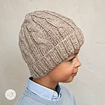 Hand knitted wool blend cable knit beanie hat kids beige rahecraft side view