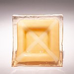 Small fused glass plate, creamy with beige cross
