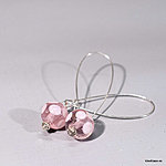 Pink glass bead earrings with tots