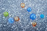 Blown glass ornaments, green and blue