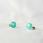 Light turquoise  glass earrings with fiber decoration.