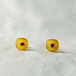 Opaque yellow fused glass earrings with copper square.          
