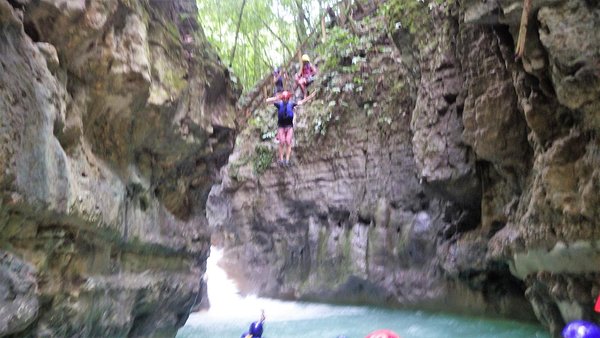 Jumping down one of the 27 waterfalls at Damajagua