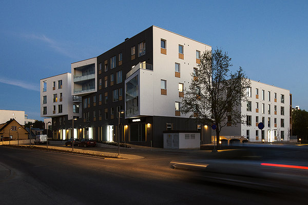 modern apartments block photographed at night 