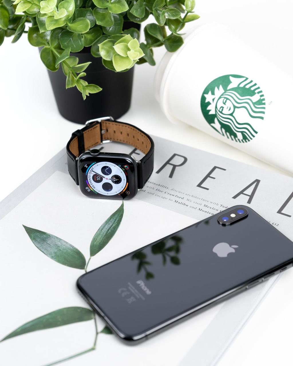 Apple watch and Iphone on magazine