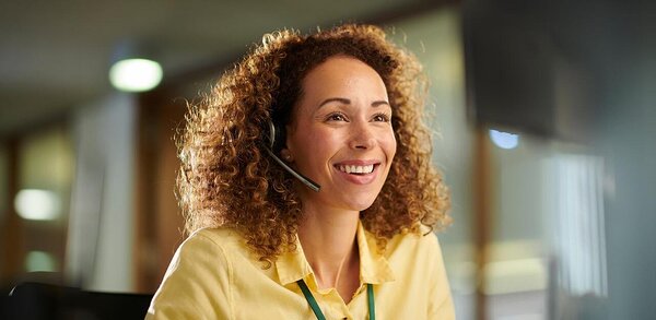 Omnichannel customer service - person wearing headset and talking on phone