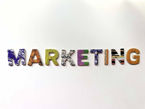 Graphical sketch spelling out "Marketing"