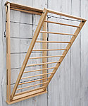 Pesuliisu wooden wall mounted drying rack - can be opened up to 80 degrees.