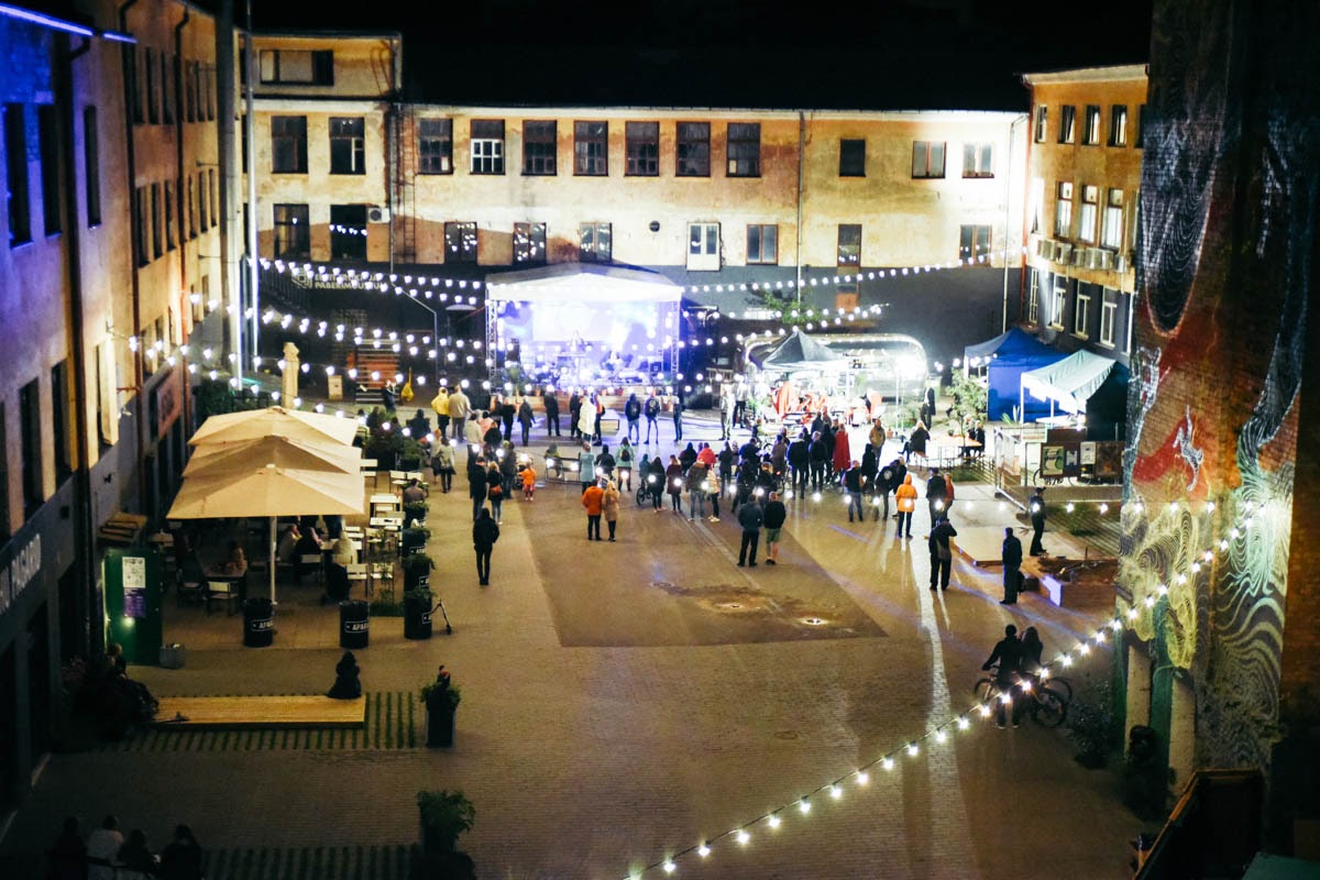An event at the 'Widget Factory' courtyard at night