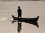 a boy reflecting in Mekong river, Myanmar