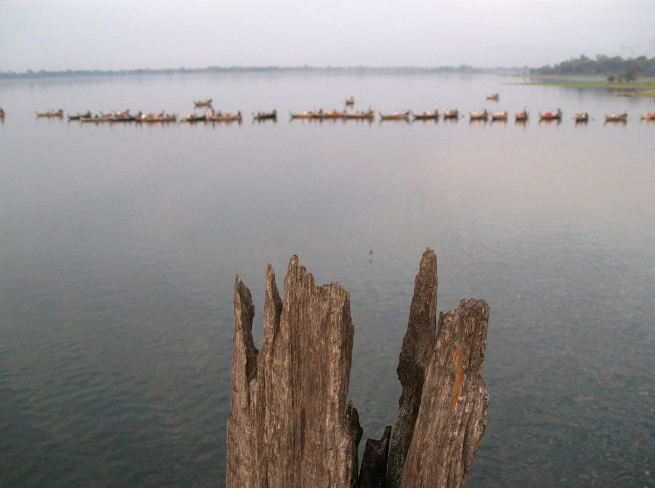 tourists lined up on the Mekong river for sunset, Myanmar