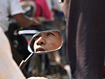 a boy in Mandalay traffic, Myanmar