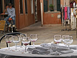 an unattended table on Burano island, Italy