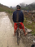 muddy back of our guide Vinh