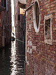 gondolier stearing his gondola, Venice, Italy