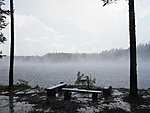 Lasa lake in rain and steam