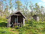 varjualune järve ääres viltuse kemmerguga
