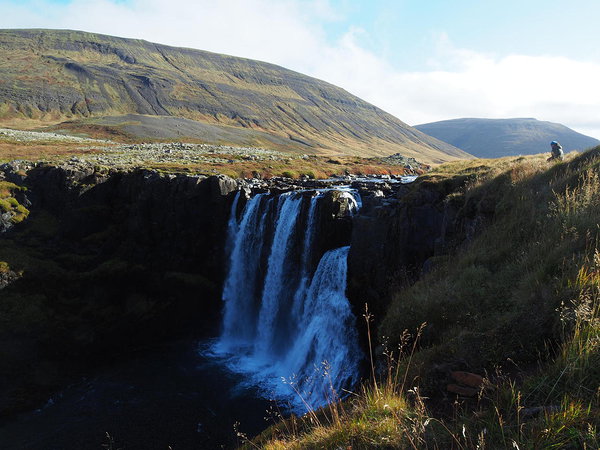 Mari and a waterfall