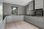 Trendy gray kitchen furniture in Norway