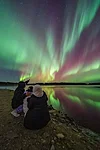 Northern Lights reflected from the surface of the river