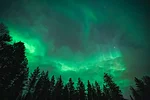 Clouds and green auroras in Rovaniemi Lapland Finland