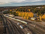 Air view of Rovaniemi railway yard and train arriving to Rovaniemi