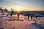 Snowshoeing down the fell in Levi, Lapland, Finland