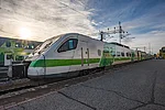 Train arriving to Rovaniemi, Lapland Finland on a sunny day