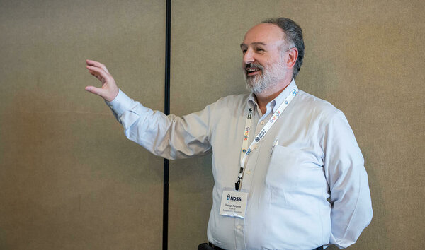 NDSS Symposium 2020, prof George C. Polyzos asking questions during DISS Workshop, Feb 2020