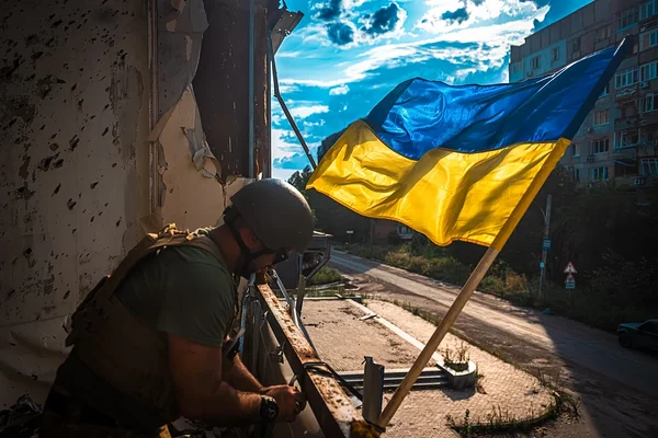 Oxana Chorna. Raising the Ukrainian flag in Avdiivka. 53rd Separate Mechanised Brigade named after Prince Volodymyr Monomakh. Avdiivka, Ukraine