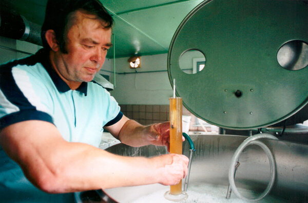2002 Aarne Trei measuring wort at his brewery in Pihtla, Saaremaa