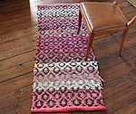 Handwoven rugs from recycled textiles and industrial surplus