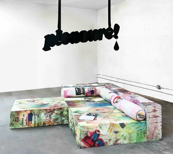 Tiedofa, 2018, tie-dyed t-shirts, wood, upholstery foam, patches, 24 x 108 x 108 inches
