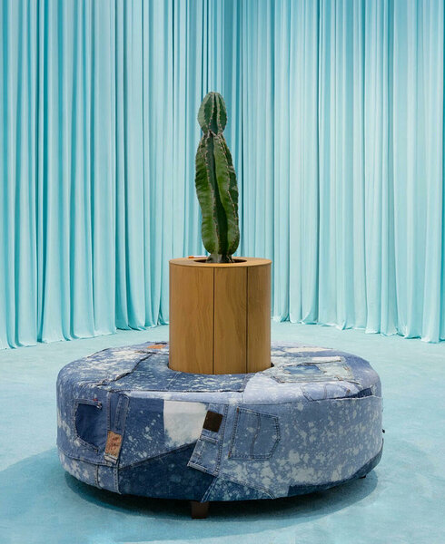 Jofa Circulaire (with Cactus), 2020, upcycled denim, wood, upholstery foam, paper cigarette, live cactus, 60 x 48 inches diameter
