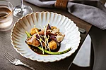 Smoked Quail with Goat Cheese Beignet (Photo: Laura Oro)