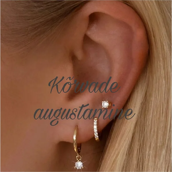 Kõrvade augustamine kahe püstoliga, blomdahl