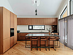 walnut veneer front panels with ceramic kitchen worktops