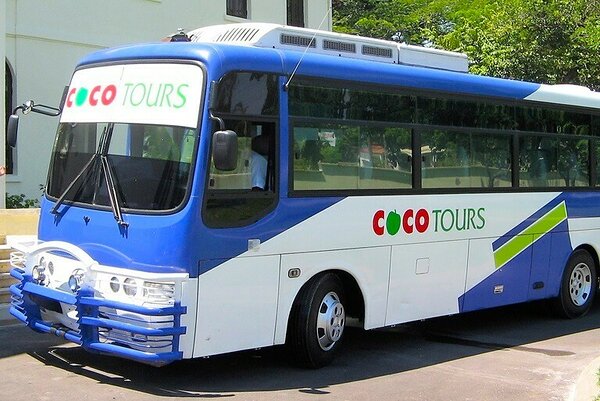 Photo of a Cocotours bus used for group transfers from Santiago to Puerto Plata