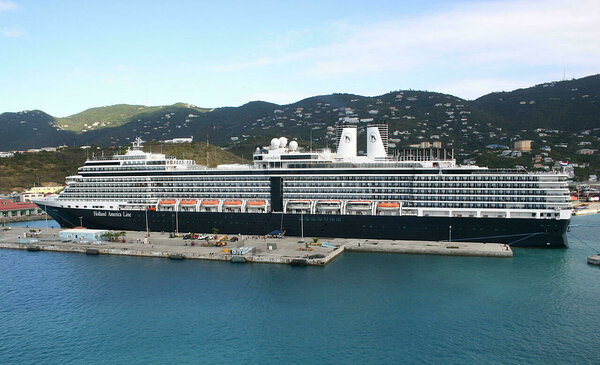 A cruise ship at anchor in Amber Cove, reachable on a Cocotours transfer