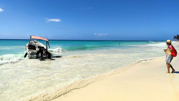 Punter about to board the launch for the short ride to lunch