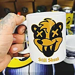 Stiff skunk skunkhead yellow black coffee mug 1