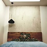 Stuccoga kaetud sein magamistoas mõjub peenelt ja efektselt