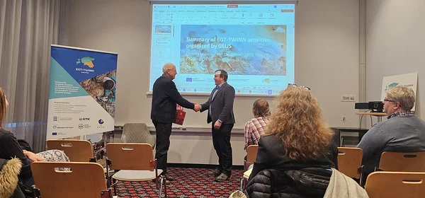 Heikki Bauert thanking Tim Kearsey (BGS; WP 2 lead) for successful project completion