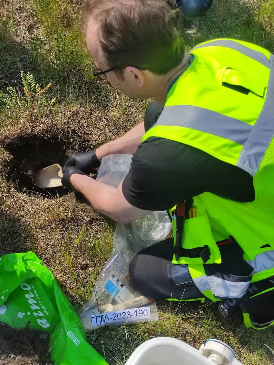 Taking soil samples in Helsinki for geochemical baseline survey